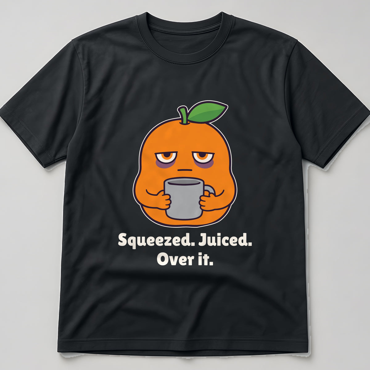 The Squeezed Orange Tee in black, flat lay