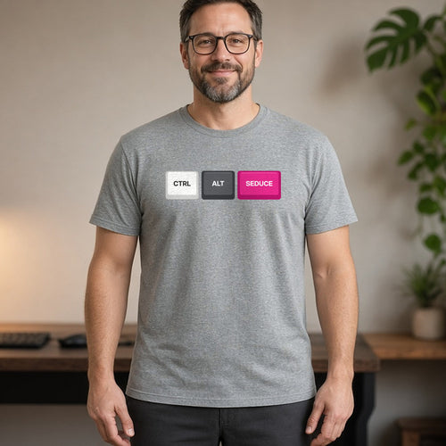 Man wearing a sport grey t-shirt printed with Ctrl Alt Seduce keycaps (spicy version). Model image is digitally generated. The print shown is the actual design; colours and fit may vary slightly, see size chart.