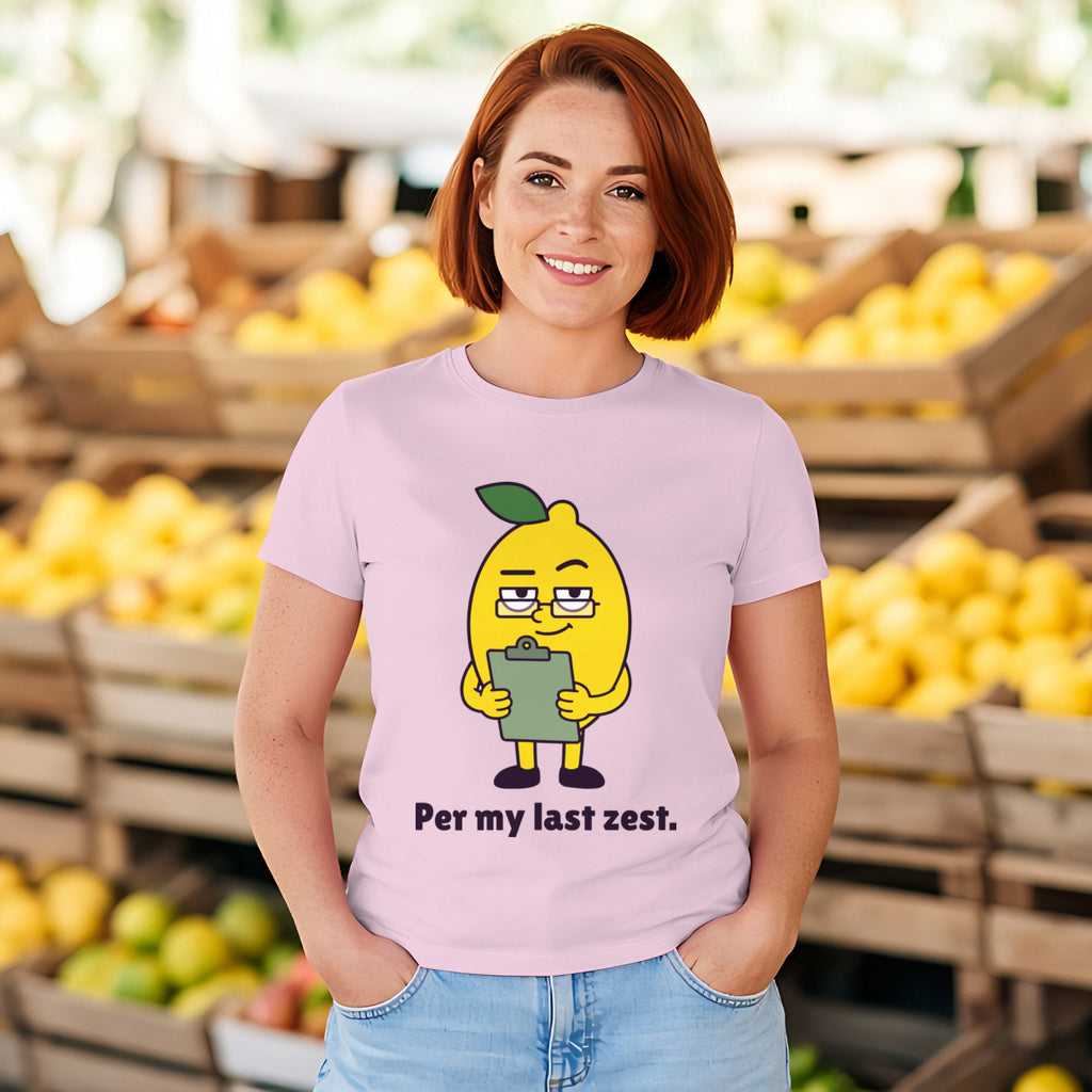 Woman with an auburn bob wearing the light pink Passive-Aggressive Lemon tee at a fruit market