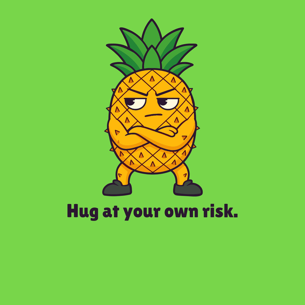 Print artwork close-up on lime: a pineapple with its arms crossed above the words 'Hug at your own risk.'