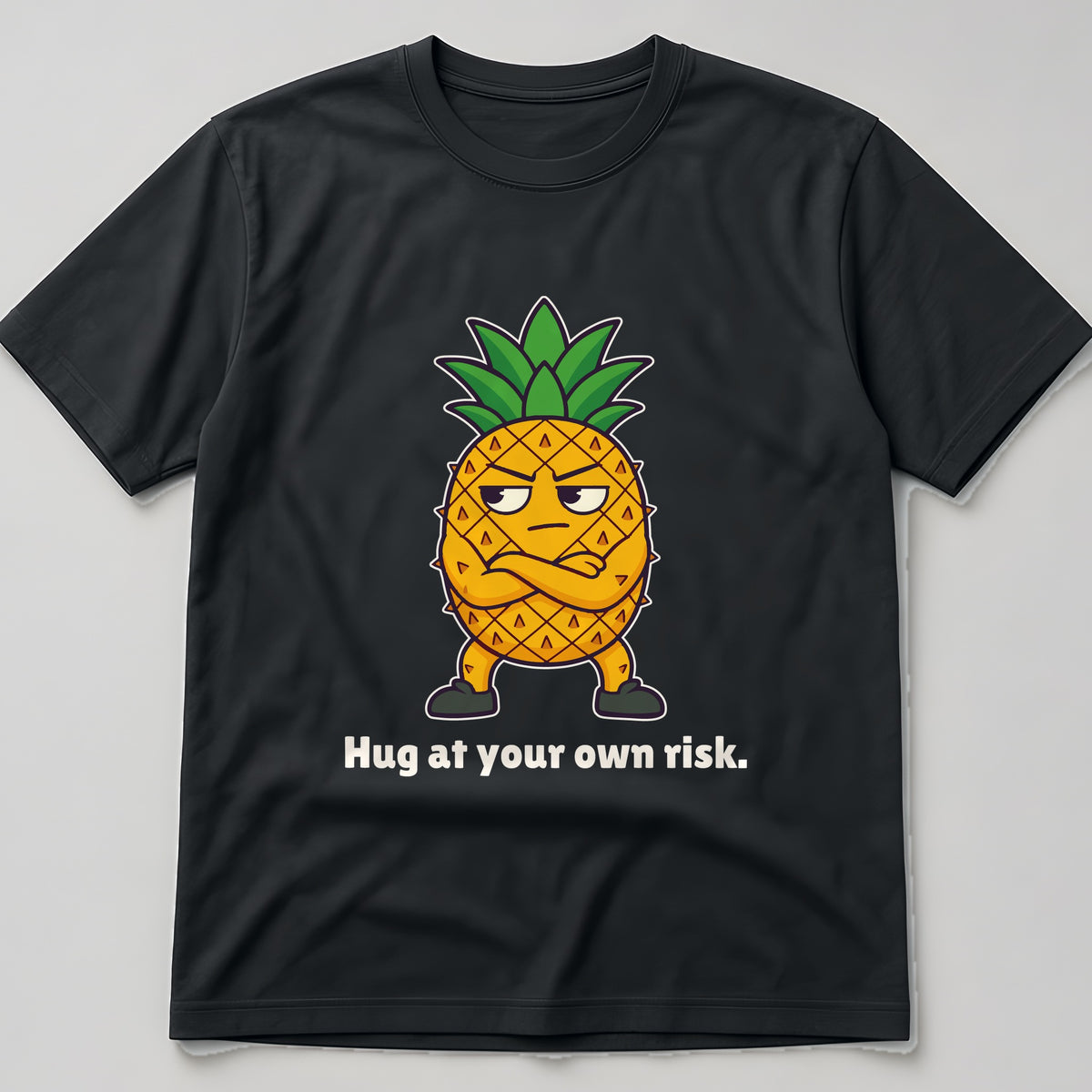 The Pineapple With Boundaries Tee in black, flat lay