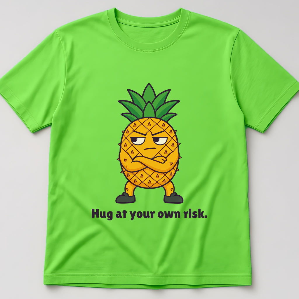 Lime t-shirt, flat lay, printed with a pineapple with its arms crossed and the words 'Hug at your own risk.'