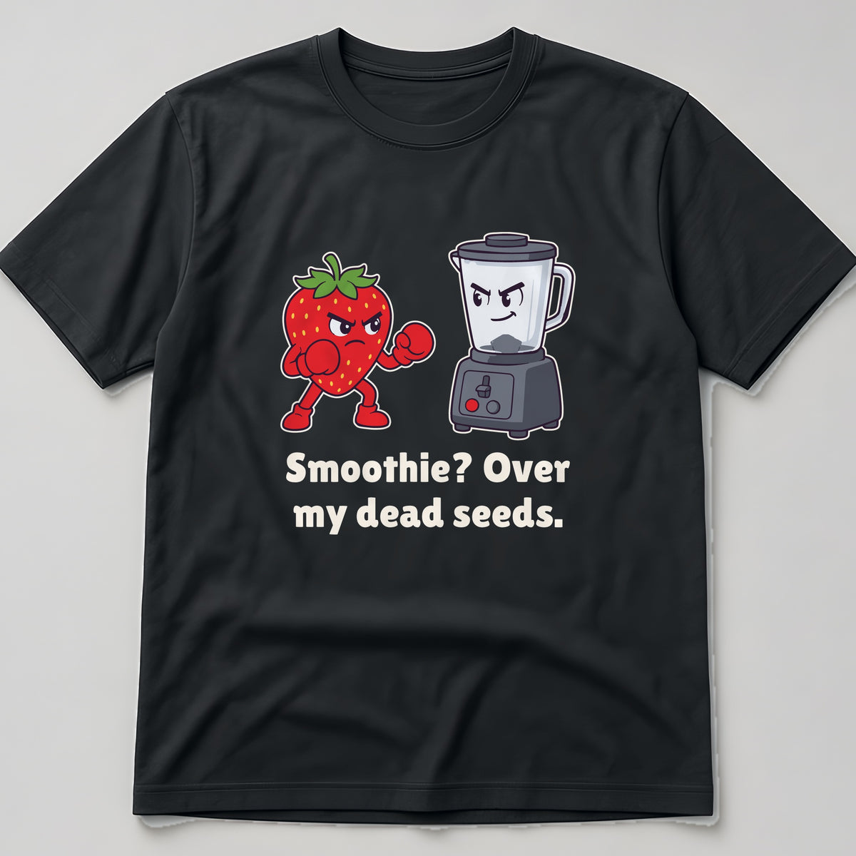 The Strawberry vs the Blender Tee in black, flat lay