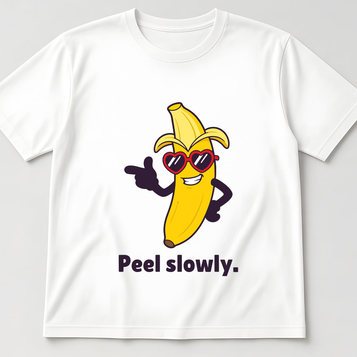 The Suave Banana Tee in white, flat lay