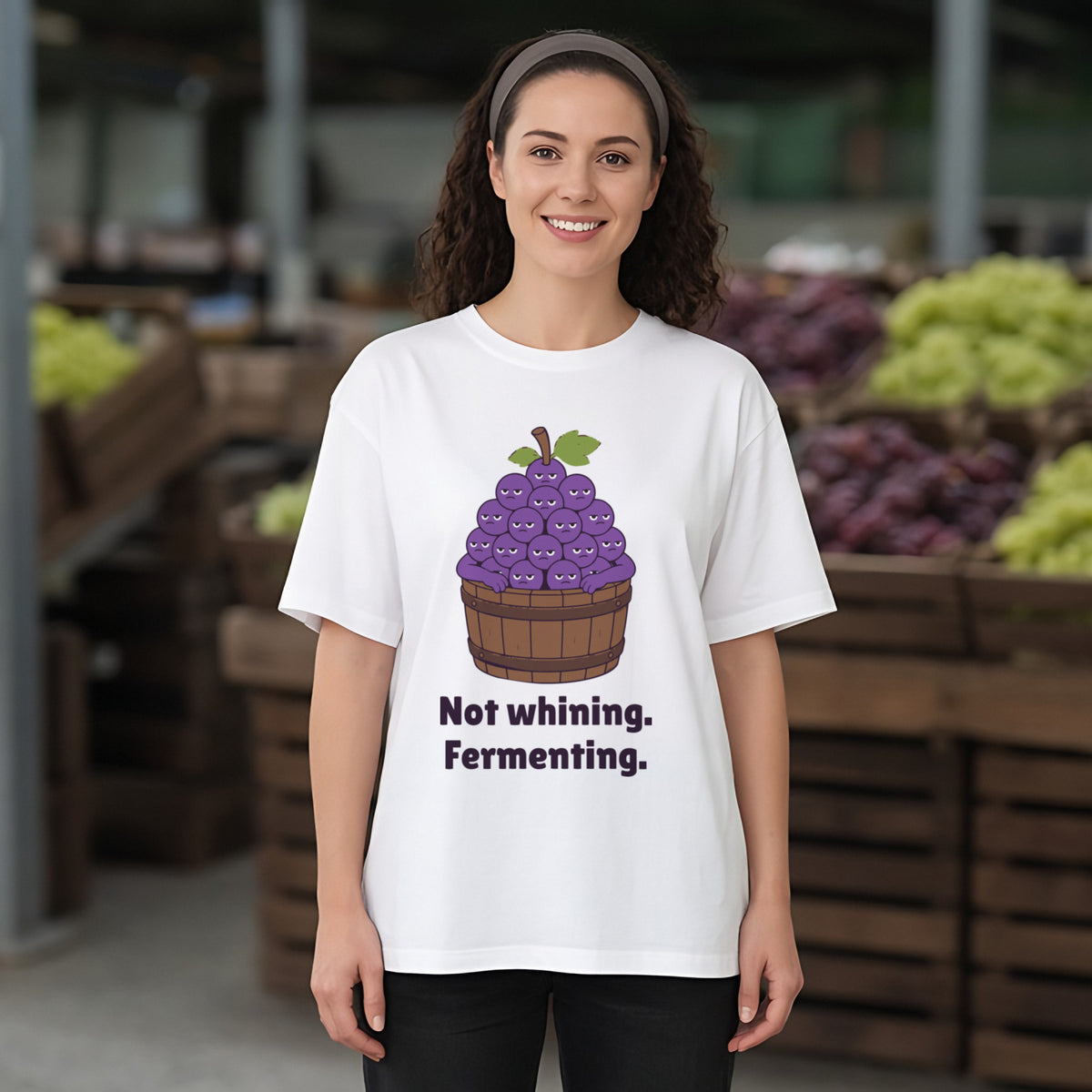 The Grumpy Grapes Tee – White worn by a model
