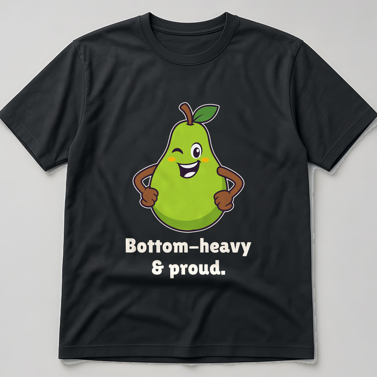The Proud Pear Tee in black, flat lay