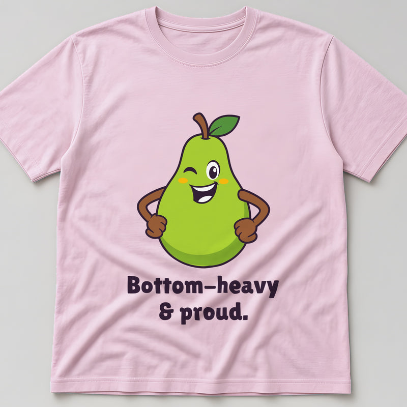 Light pink t-shirt, flat lay, printed with a grinning pear with its hands on its hips and the words 'Bottom-heavy & proud.'