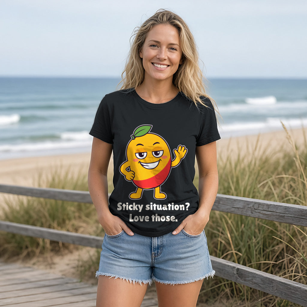 The Sticky Mango Tee in black, worn by a model