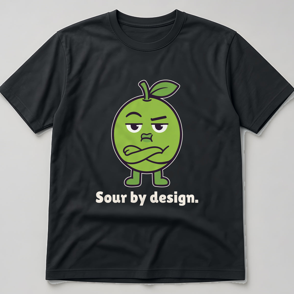 The Sour Lime Tee in black, flat lay