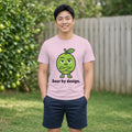The Sour Lime Tee in light pink, worn by a model