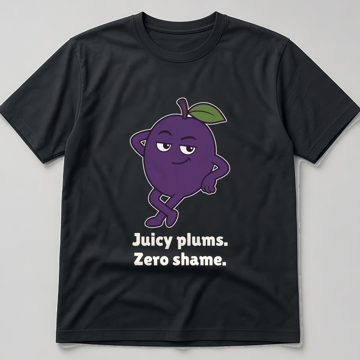 The Shameless Plum Tee in black, flat lay