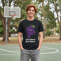 The Shameless Plum Tee – Black worn by a model
