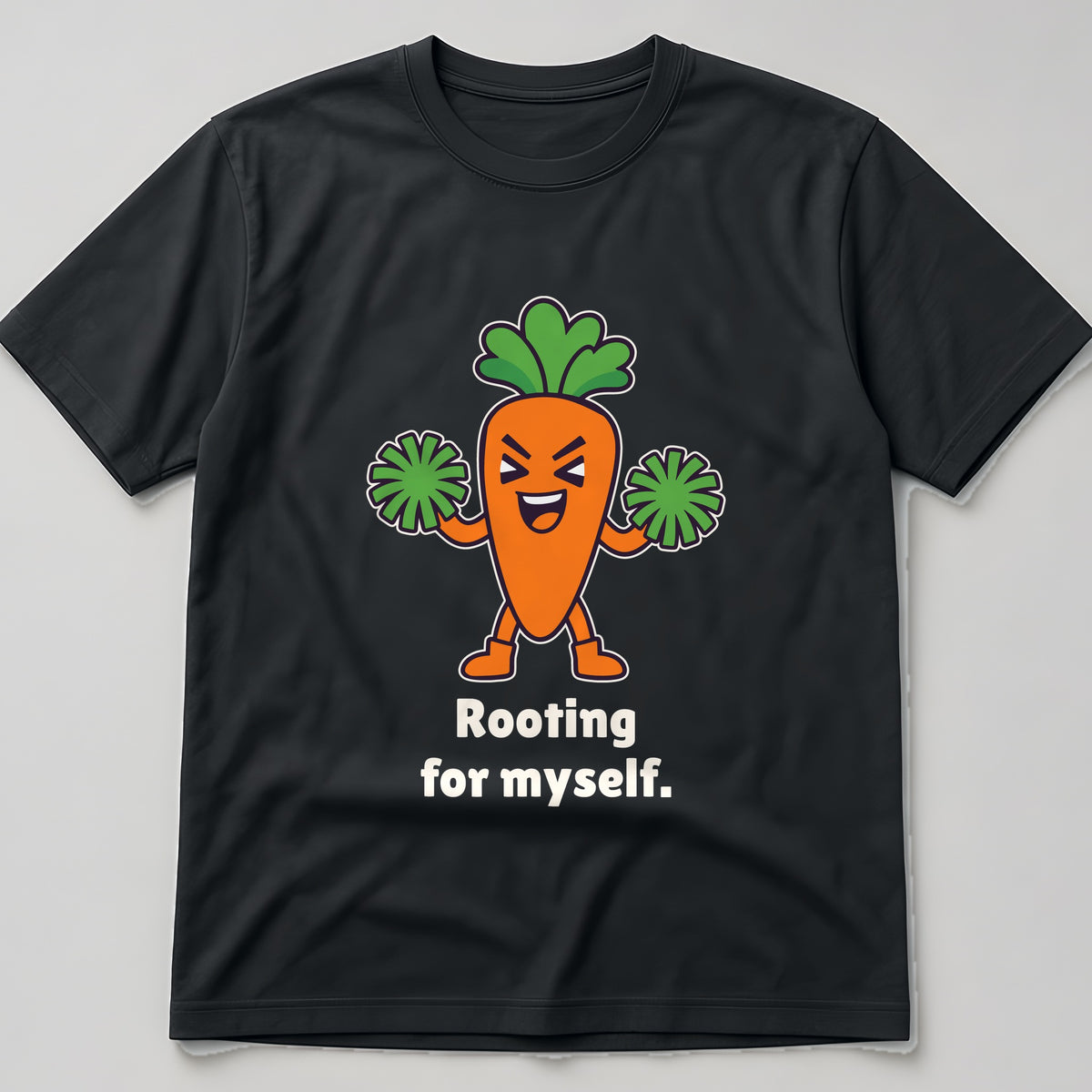 The Self-Motivated Carrot Tee in black, flat lay