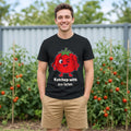 The Saucy Tomato Tee in black, worn by a model