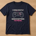 Navy t-shirt, flat lay, printed with 'I know exactly which buttons to press.'