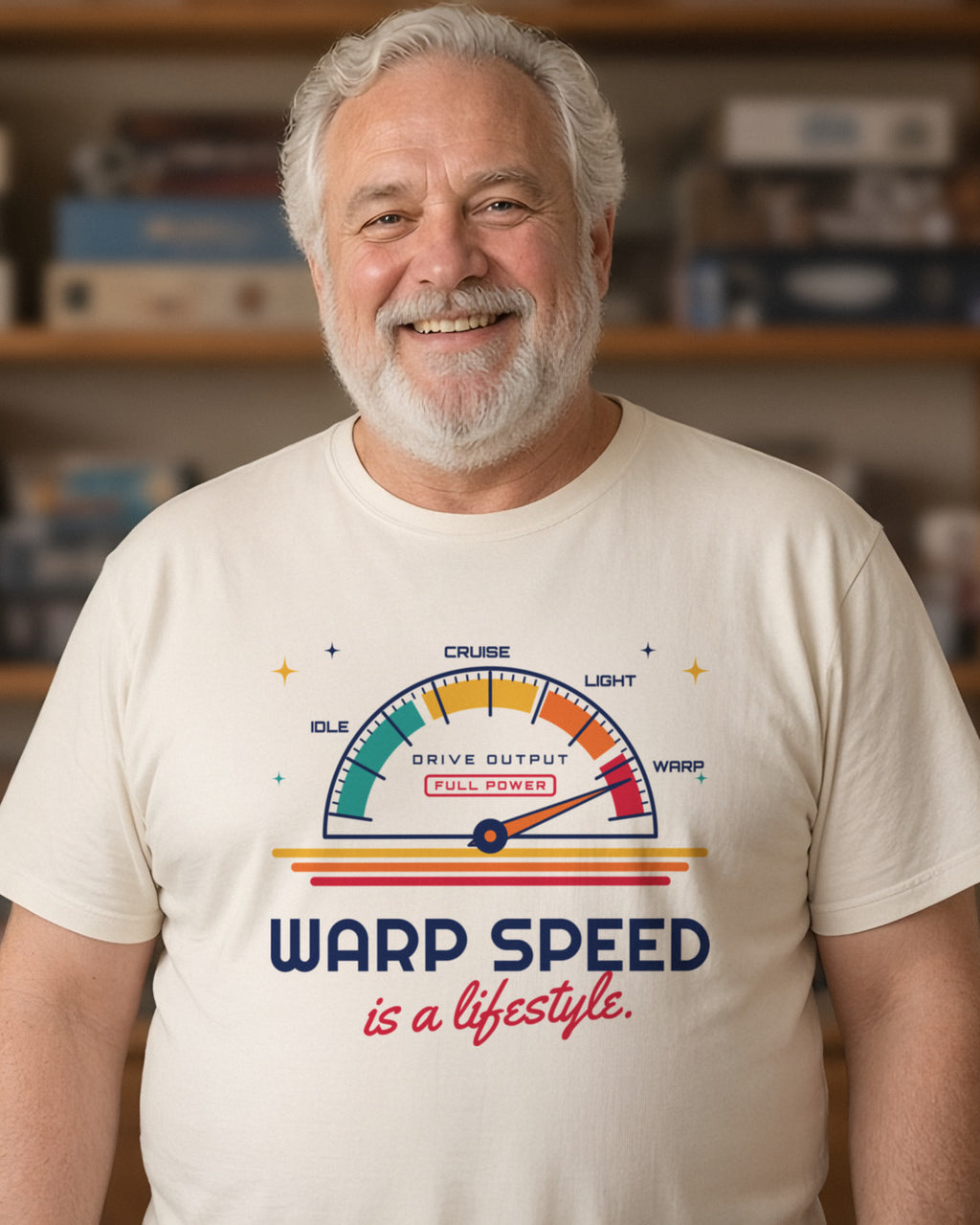 Man wearing a natural t-shirt printed with 'Warp speed is a lifestyle.' (clean version), in a living room (4:5 crop). Colours and fit may vary slightly, see size chart.