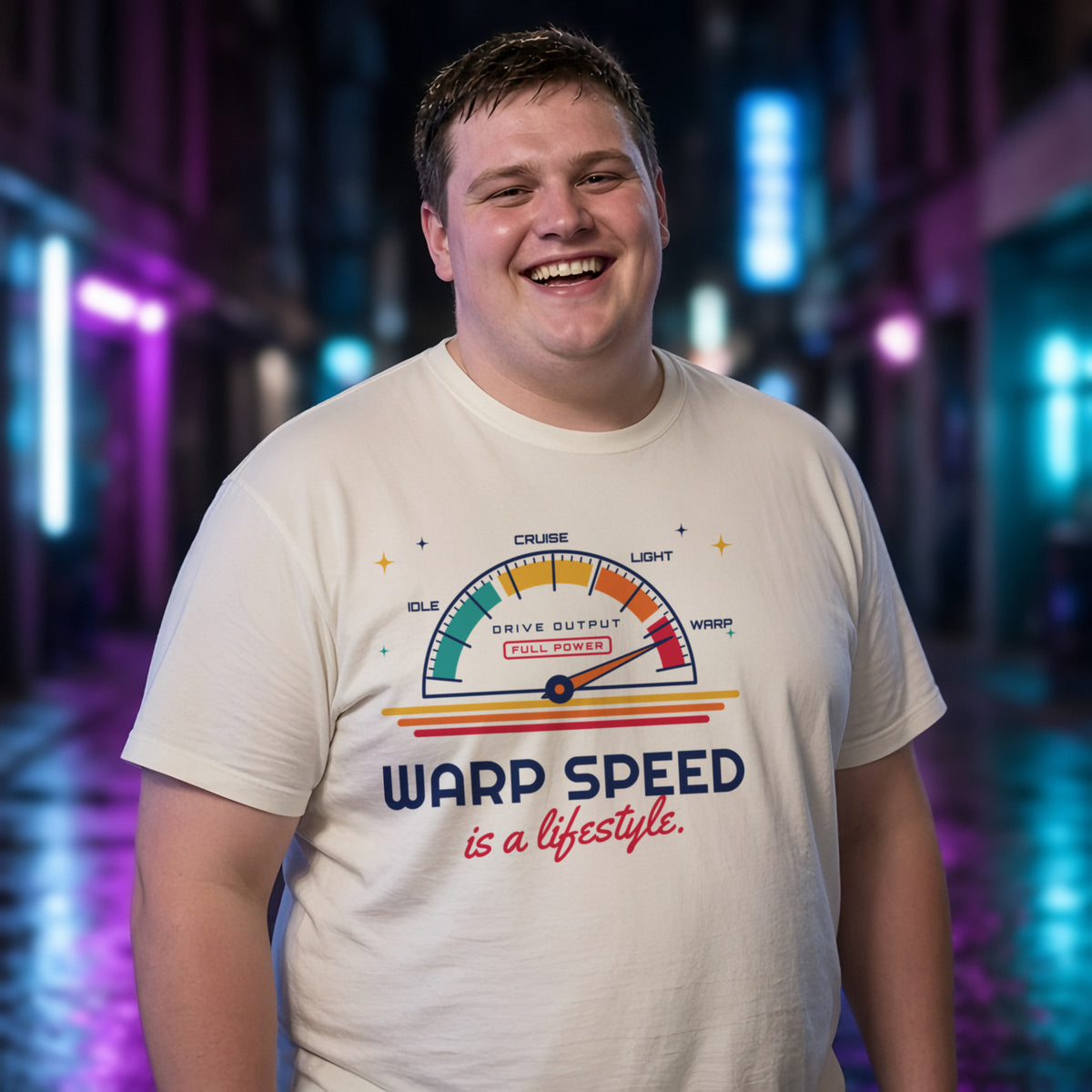 Man wearing a natural t-shirt printed with 'Warp speed is a lifestyle.' (clean version), in a neon-lit laneway. Model image is digitally generated. The print shown is the actual design; colours and fit may vary slightly, see size chart.