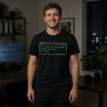 Man wearing a black t-shirt printed with 'I like my code like my dates: clean, commented, no bugs' (Spicy version), at a coding desk. Model image is digitally generated. The print shown is the actual design; colours and fit may vary slightly, see size chart.