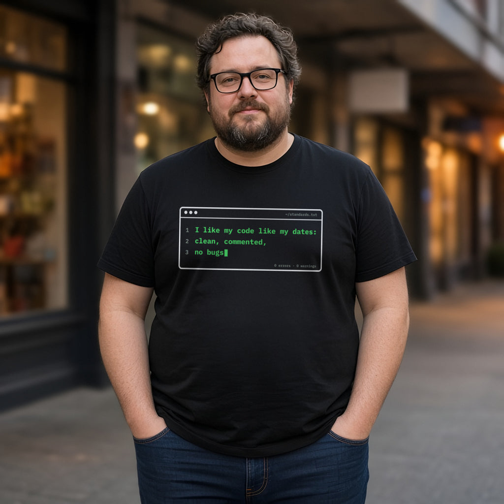 Man wearing a black t-shirt printed with 'I like my code like my dates: clean, commented, no bugs' (Spicy version), on a street at dusk. Model image is digitally generated. The print shown is the actual design; colours and fit may vary slightly, see size chart.