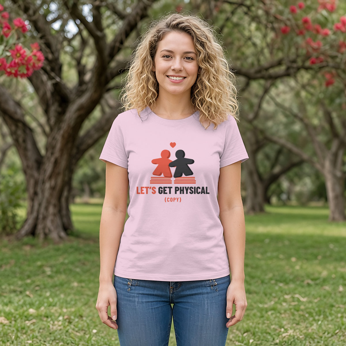 Meeple Hearts Board Game Tee in Light Pink, worn by a model
